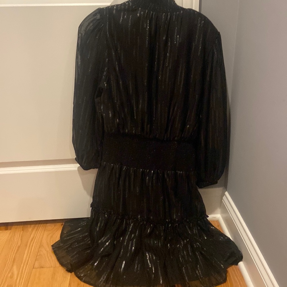 Black bohemian dress with silver accents throughout